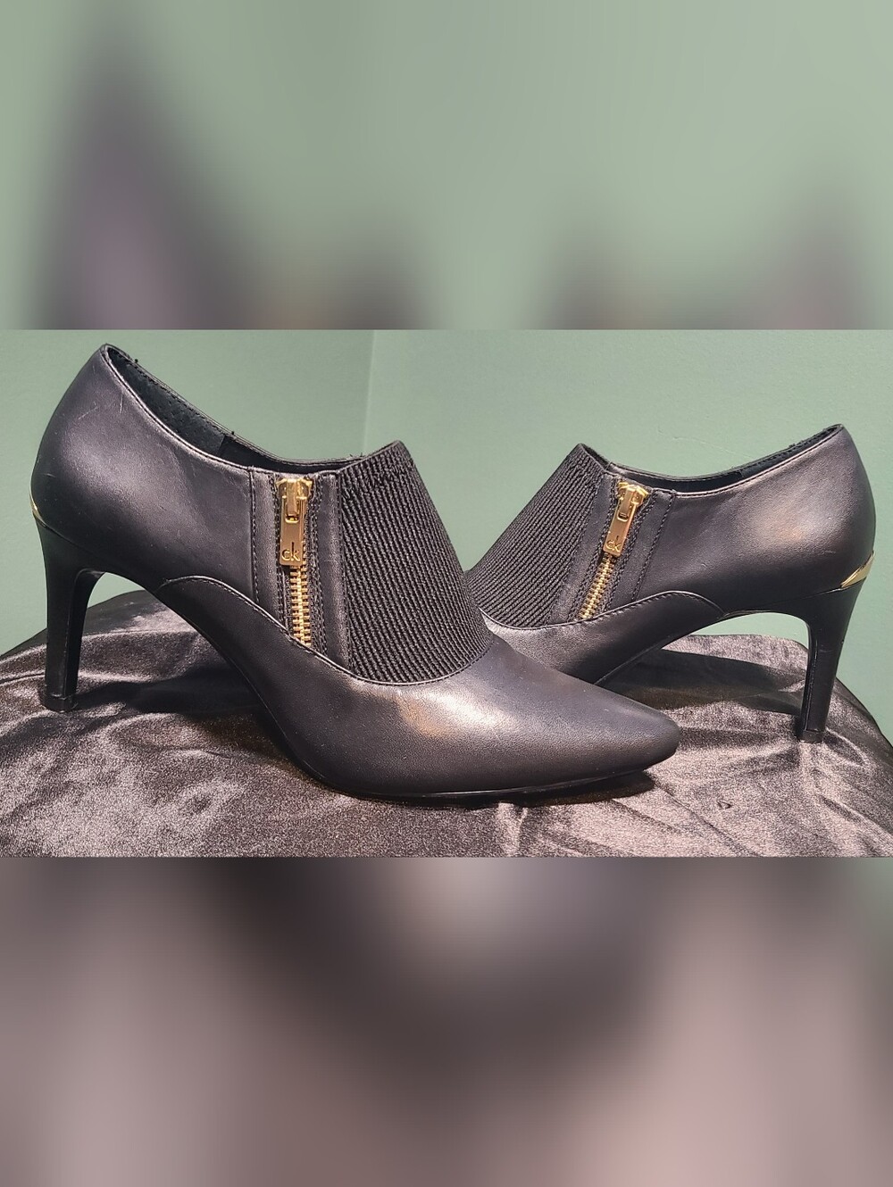 Calvin Klein Black Pointed-Heel Slip-On Pumps with Gold Zipper